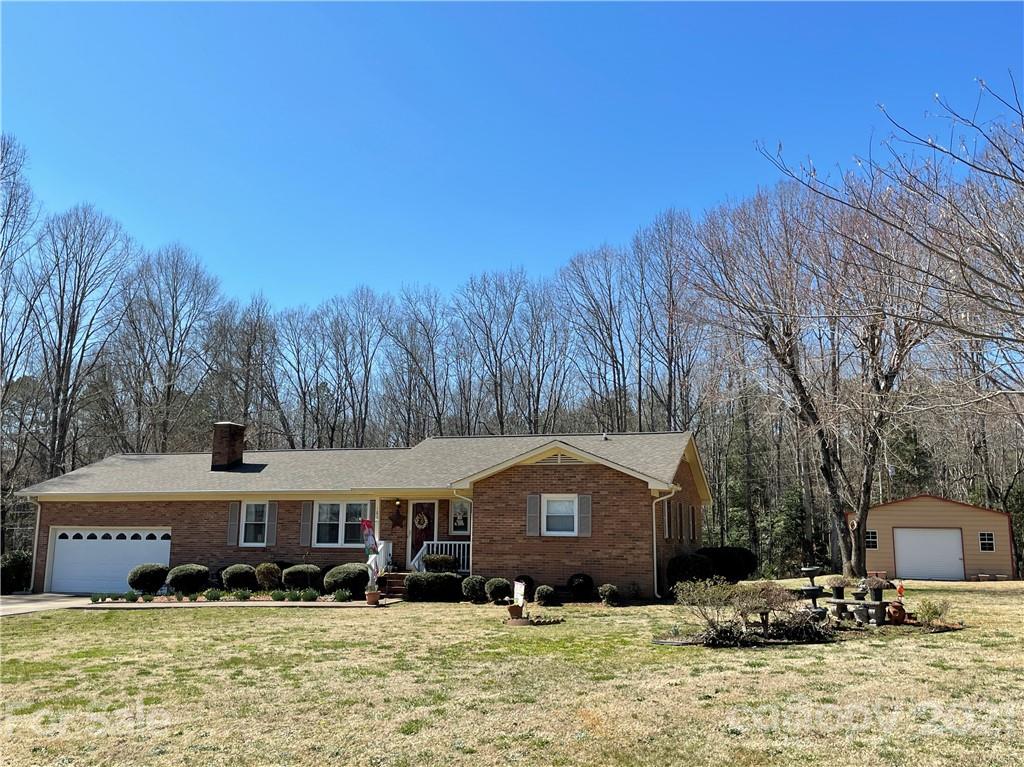 180 Watergate Drive Alexis, NC 28006 - Photo 1 of 40 a front view of house with yard and trees