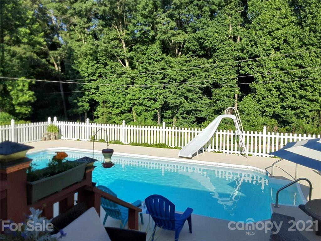 180 Watergate Drive Alexis, NC 28006 - Photo 2 of 40 a view of a balcony with a swing