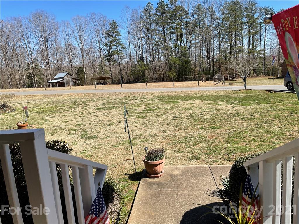 180 Watergate Drive Alexis, NC 28006 - Photo 11 of 40 a view of a yard with wooden fence