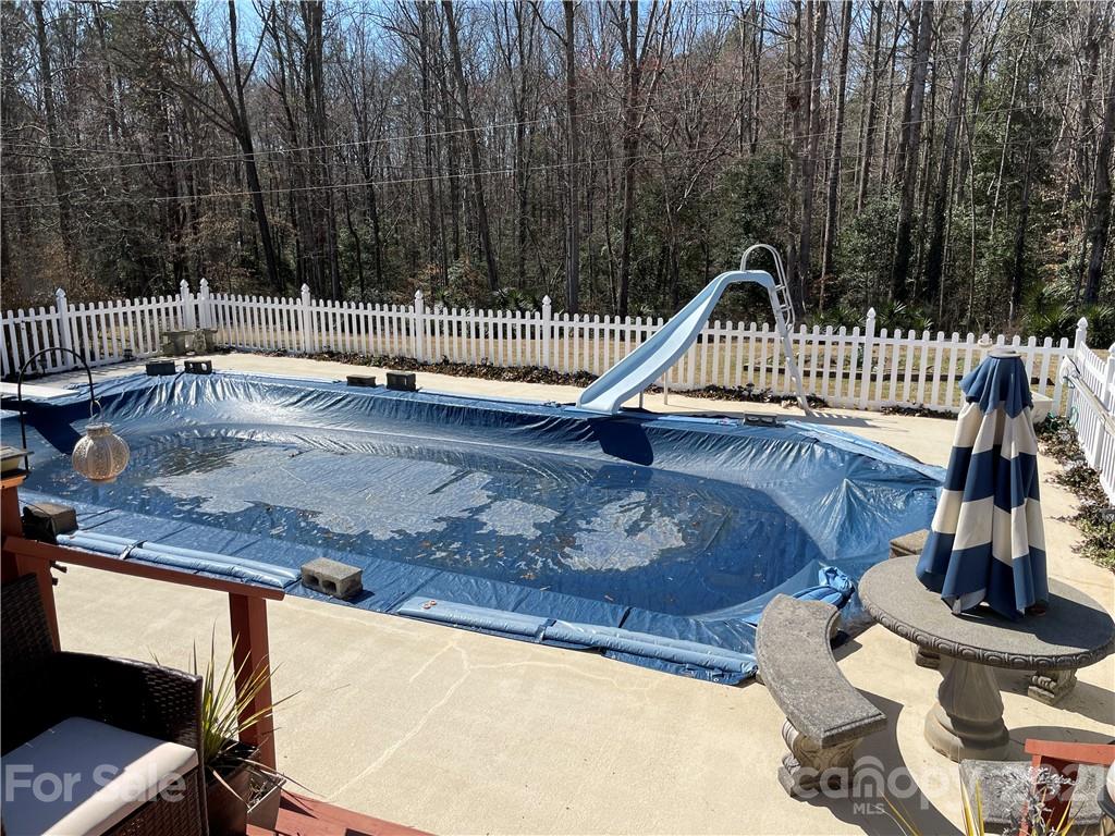 180 Watergate Drive Alexis, NC 28006 - Photo 3 of 40 a view of a roof deck with potted plants