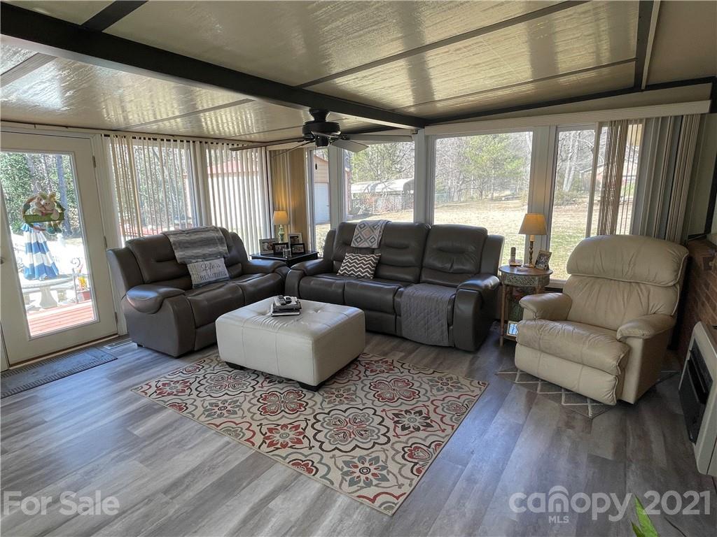 180 Watergate Drive Alexis, NC 28006 - Photo 25 of 40 a living room with furniture and a large window