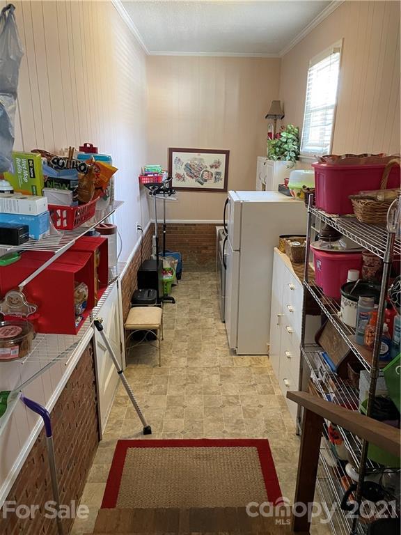 180 Watergate Drive Alexis, NC 28006 - Photo 35 of 40 a room with storage and utility