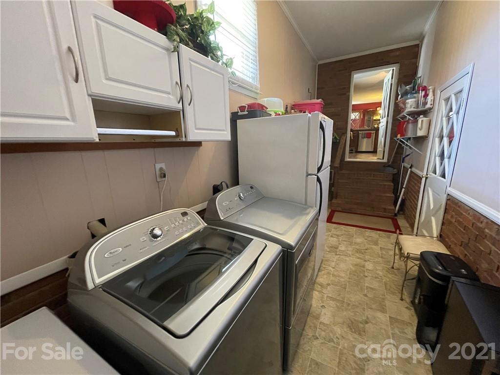 180 Watergate Drive Alexis, NC 28006 - Photo 36 of 40 a utility room with dryer and washer