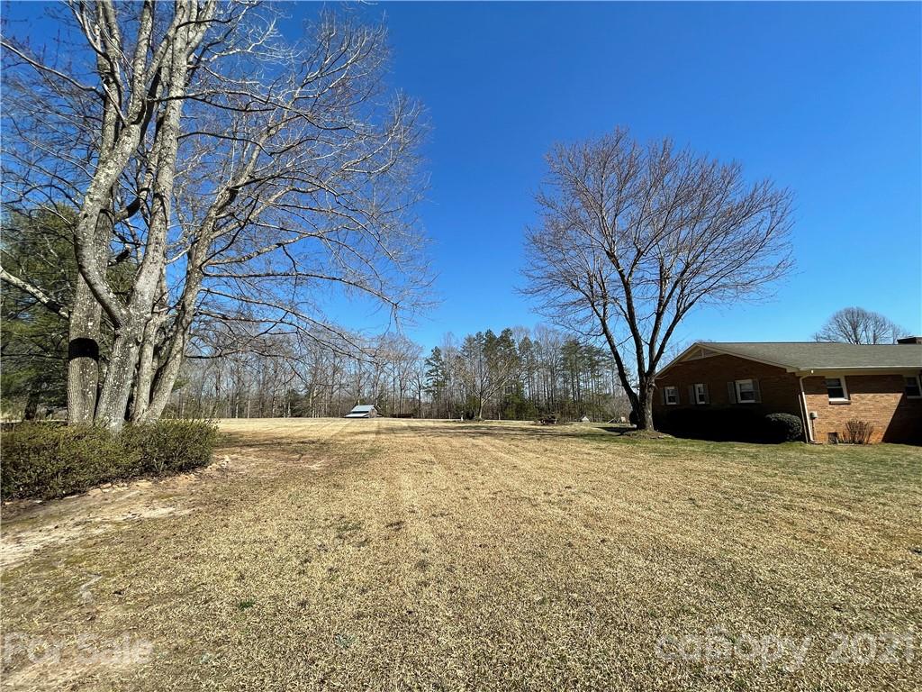 180 Watergate Drive Alexis, NC 28006 - Photo 9 of 40 a view of a yard with a house