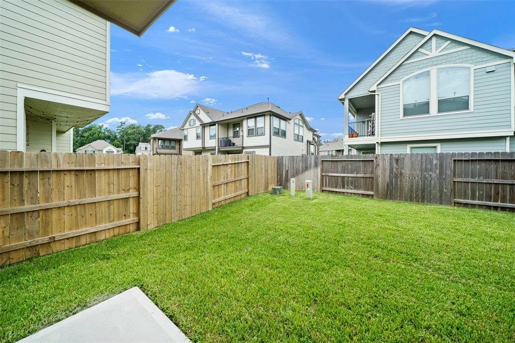 4241 Merry Mill Drive Spring, TX 77386 - Photo 22 of 24 a front view of a house with a yard