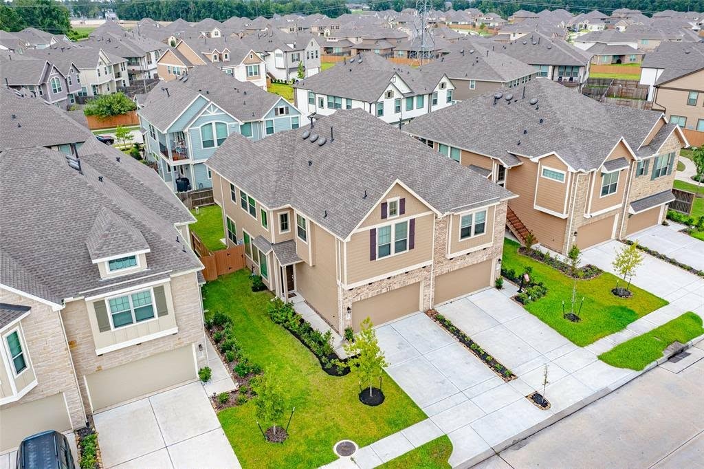 4241 Merry Mill Drive Spring, TX 77386 - Photo 3 of 24 an aerial view of residential houses with outdoor space
