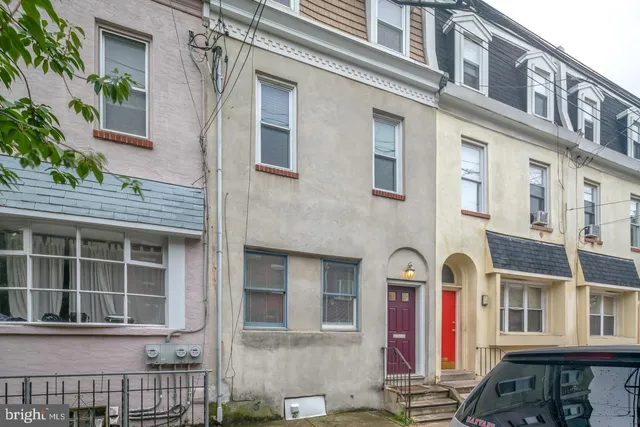a front view of a multi story residential apartment building