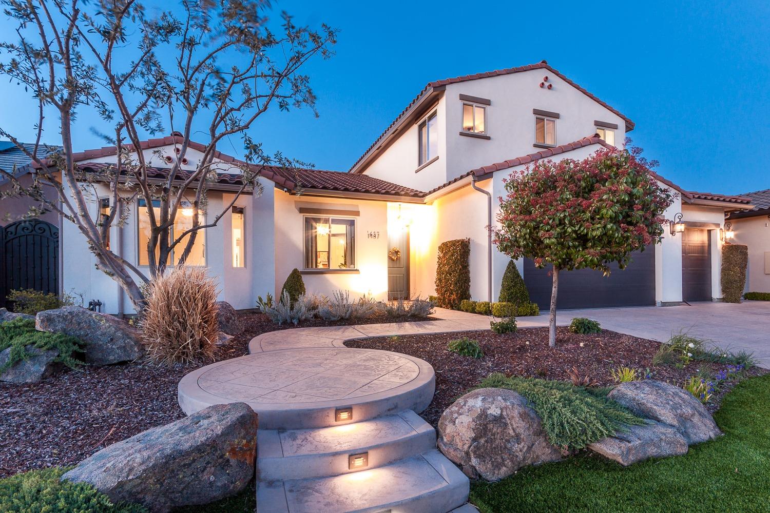 1437 Jordan Avenue Clovis, CA 93611 - Photo 1 of 53 a view of a house with backyard and sitting area