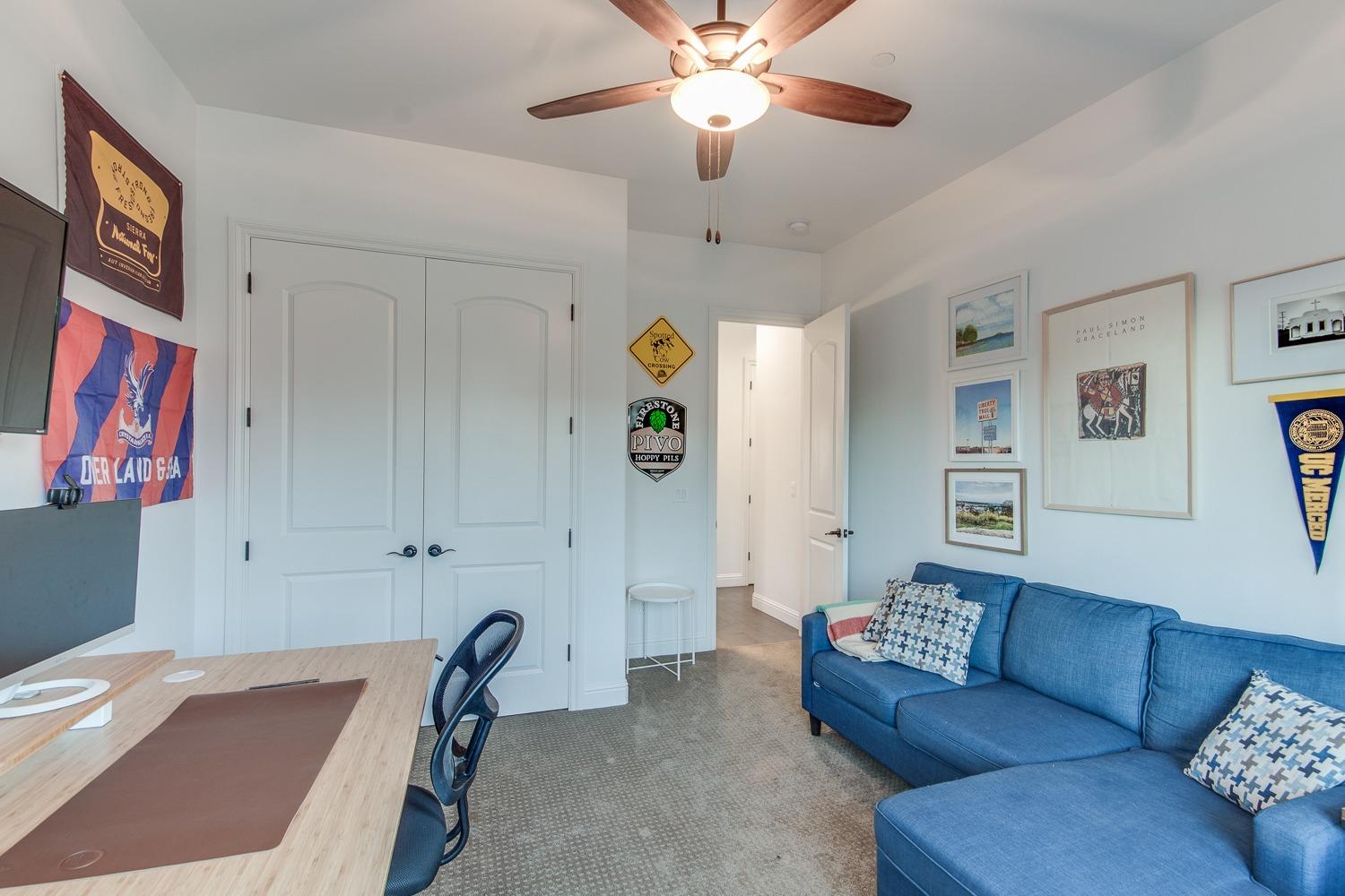 1437 Jordan Avenue Clovis, CA 93611 - Photo 22 of 53 a living room with furniture and a window