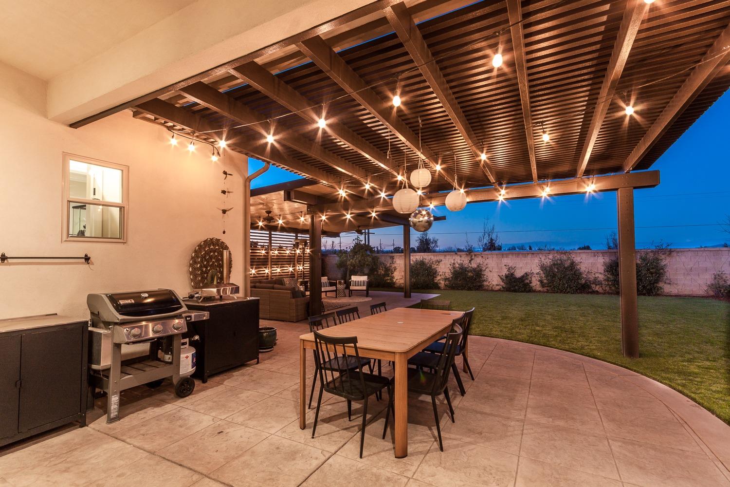 1437 Jordan Avenue Clovis, CA 93611 - Photo 37 of 53 a patio with a table and chairs