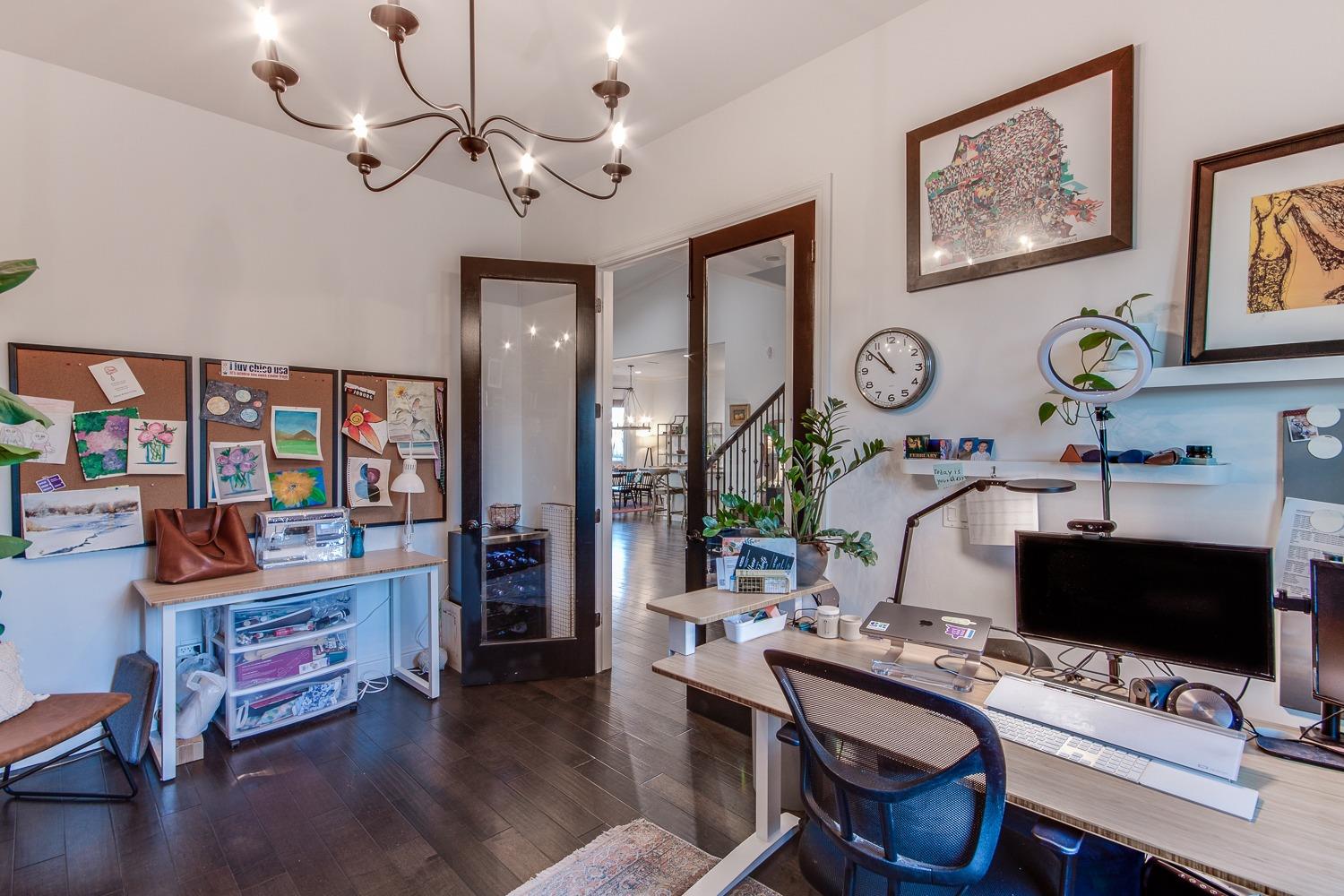 1437 Jordan Avenue Clovis, CA 93611 - Photo 9 of 53 a workspace with furniture and wooden floor