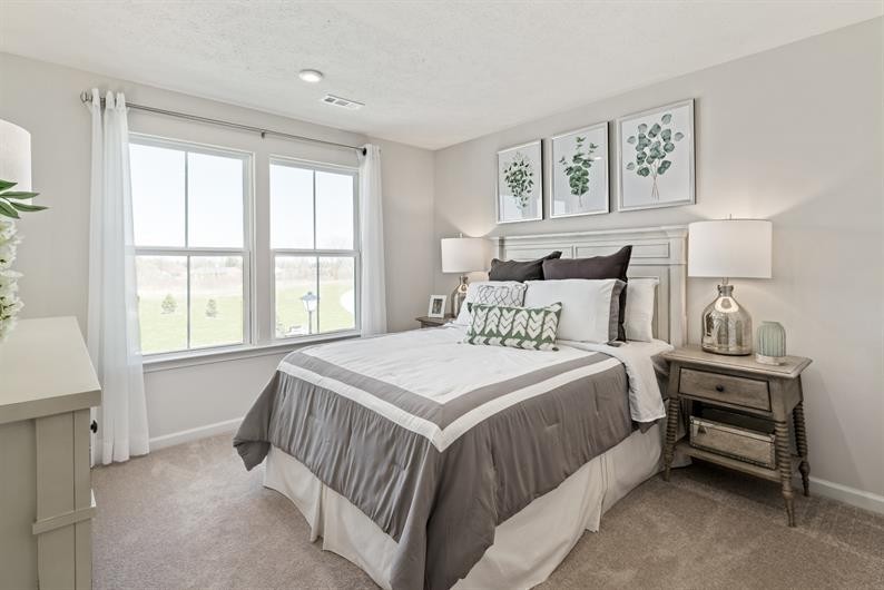 1324 Crescent Ridge Drive Gallatin, TN 37066 - Photo 20 of 25 a bedroom with a bed and a window