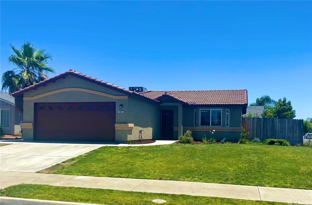 1895 Madison Drive Madera, CA 93638 - Photo 1 of 1 a front view of house with a garden