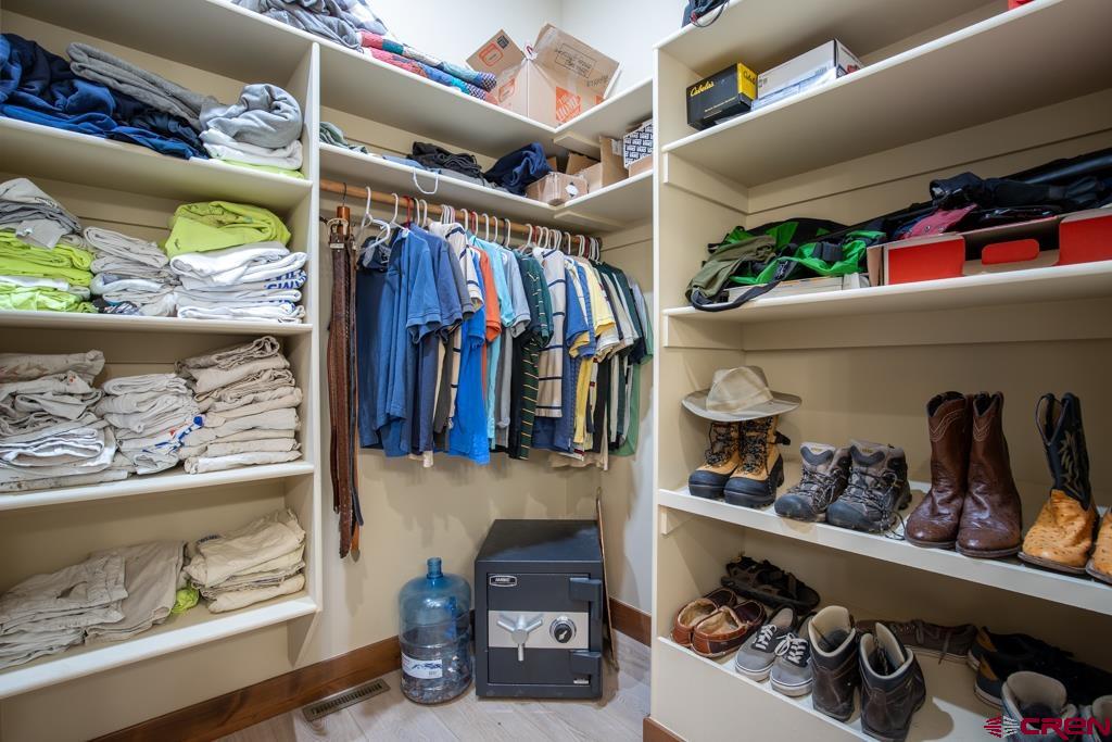 62 Manitou Lane Durango, CO 81301 - Photo 16 of 34 a view of walk in closet with clothes and shoes