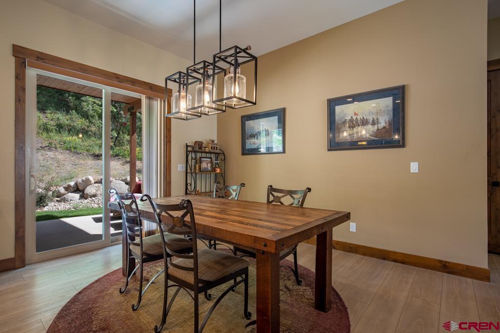 62 Manitou Lane Durango, CO 81301 - Photo 26 of 34 a view of a dining room with furniture window and outside view