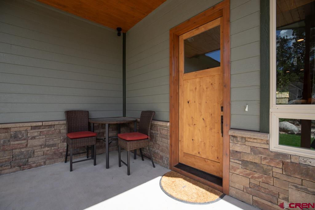 62 Manitou Lane Durango, CO 81301 - Photo 28 of 34 a balcony with table and chairs