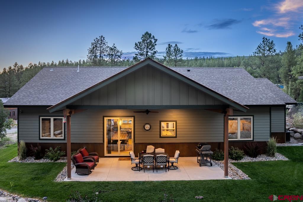 62 Manitou Lane Durango, CO 81301 - Photo 4 of 34 a view of outdoor space yard deck patio and fire pit