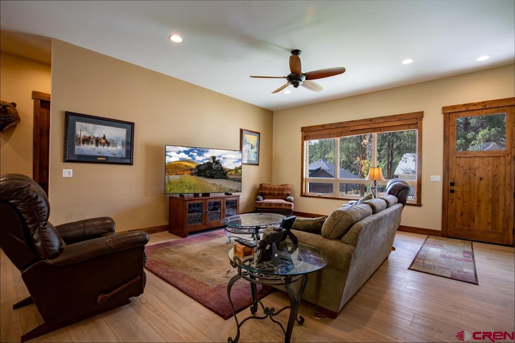 62 Manitou Lane Durango, CO 81301 - Photo 10 of 34 a living room with furniture and a large window