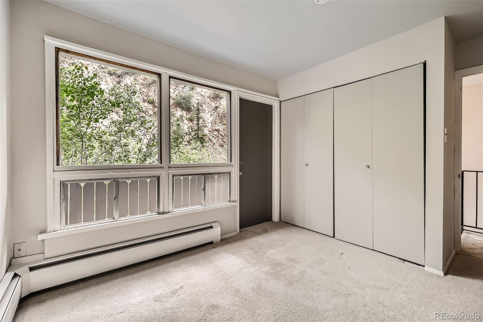 817 Valley View Drive Georgetown, CO 80444 - Photo 16 of 30 a view of an empty room with a window