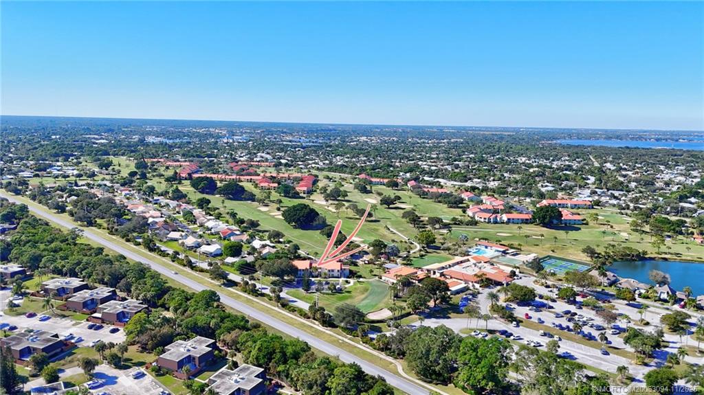 5111 Southeast Miles Grant Road, Unit 103 Stuart, FL 34997 - Photo 35 of 59 an aerial view of a city