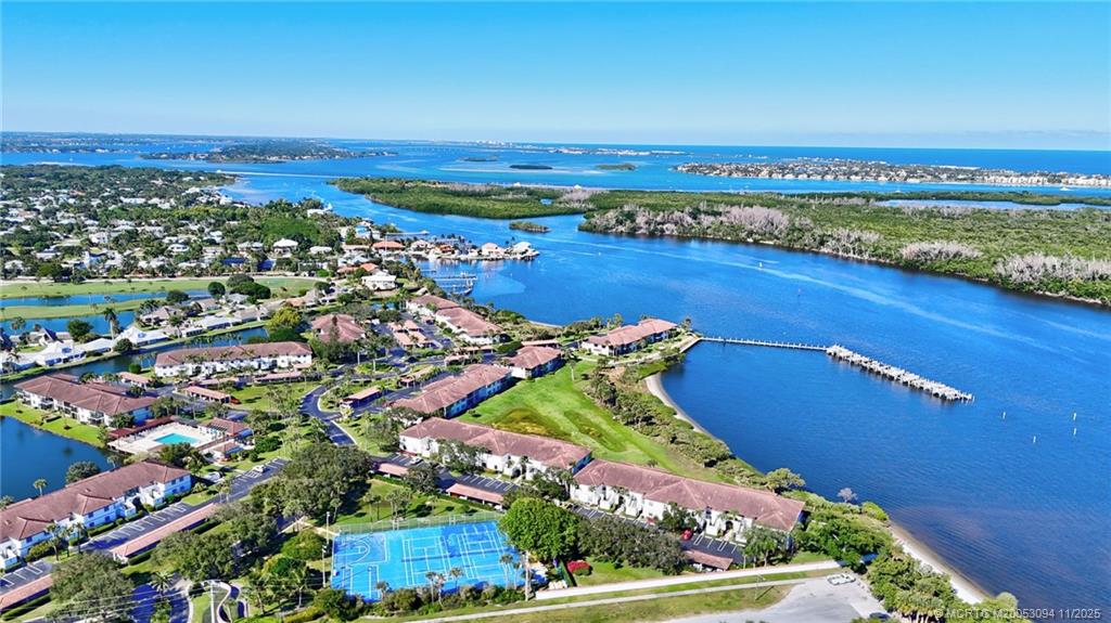 5111 Southeast Miles Grant Road, Unit 103 Stuart, FL 34997 - Photo 38 of 59 view of a city with an ocean view