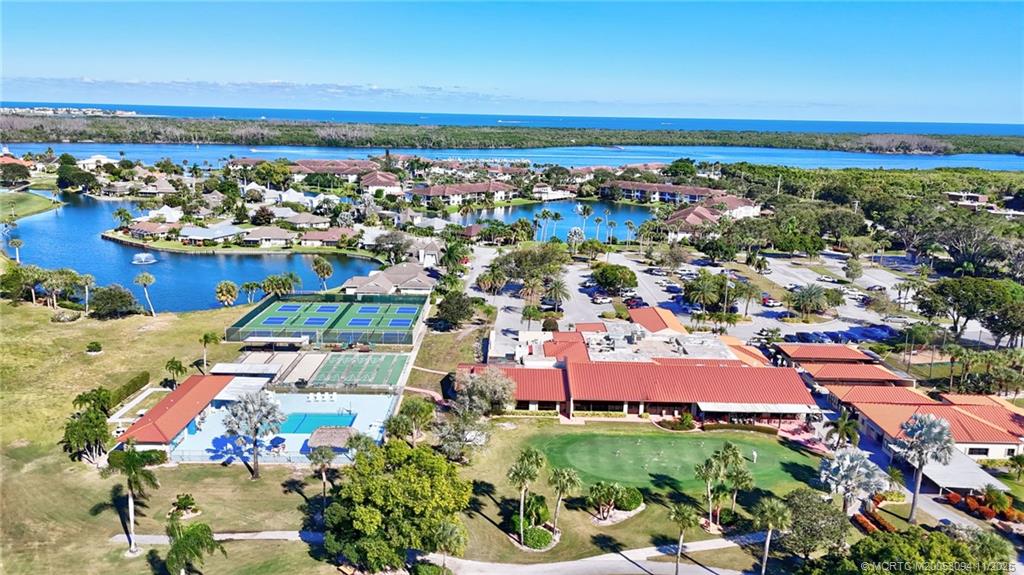 5111 Southeast Miles Grant Road, Unit 103 Stuart, FL 34997 - Photo 46 of 59 an aerial view of a city