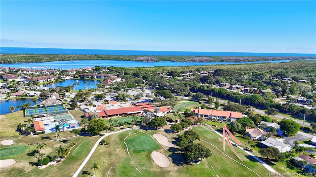 5111 Southeast Miles Grant Road, Unit 103 Stuart, FL 34997 - Photo 50 of 59 an aerial view of a city