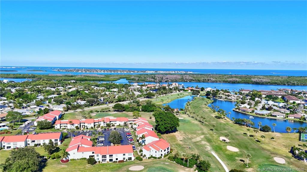 5111 Southeast Miles Grant Road, Unit 103 Stuart, FL 34997 - Photo 52 of 59 a view of a city with an ocean view