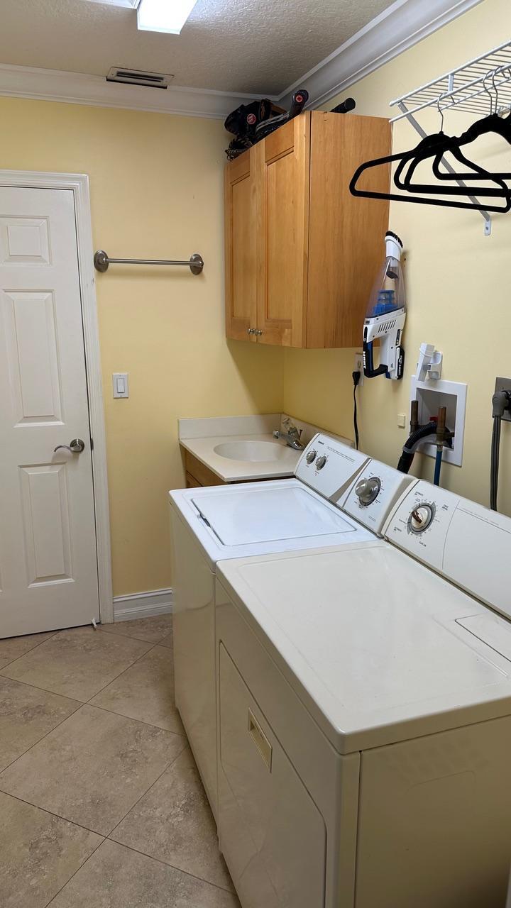 6594 Casabella Lane Boca Raton, FL 33433 - Photo 23 of 28 a utility room with dryer and washer