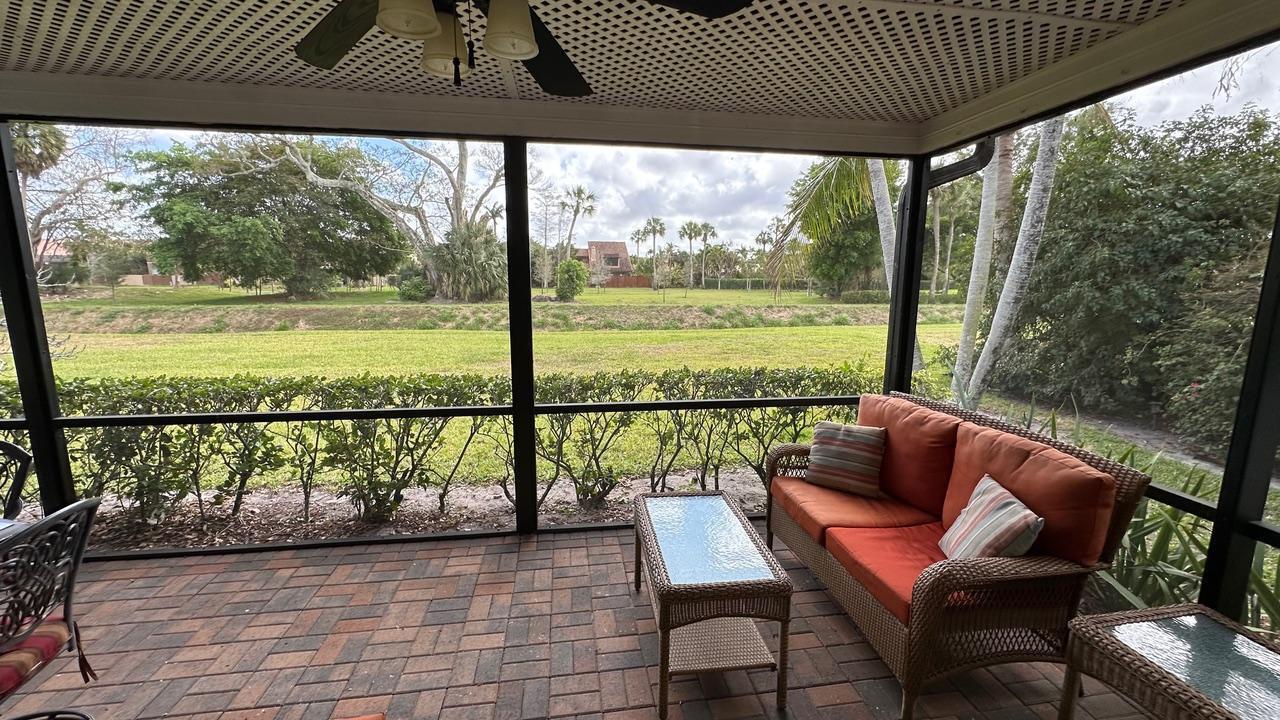6594 Casabella Lane Boca Raton, FL 33433 - Photo 8 of 28 a view of a chair and tables in the balcony