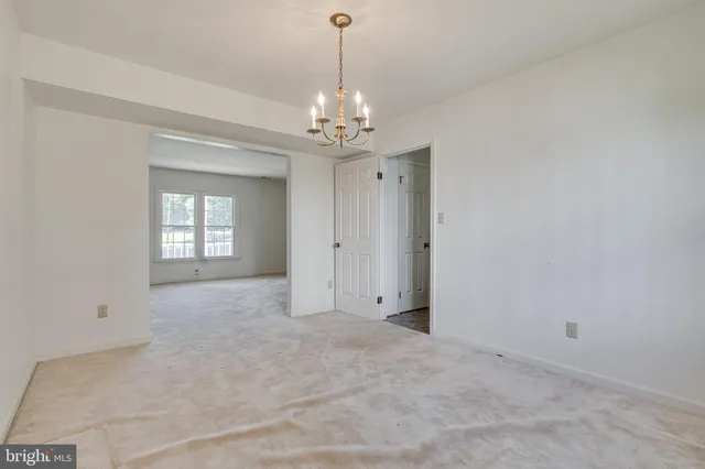 a view of an empty room with window