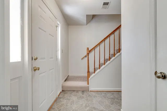 a view of an entryway with staircase