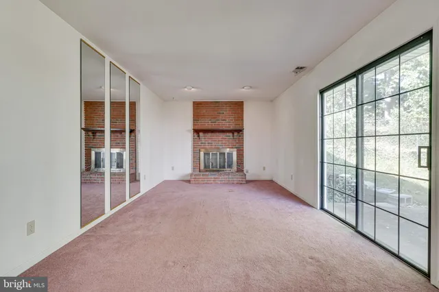 an empty room with windows