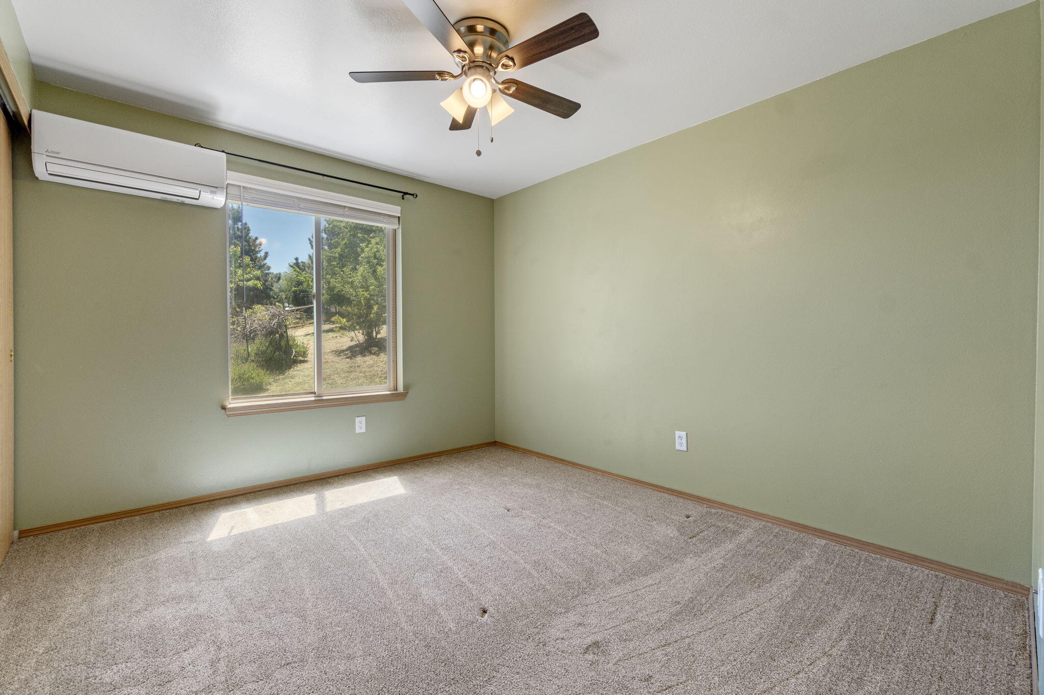 2630 Frontage Road Klamath Falls, OR 97601 - Photo 50 of 72 an empty room with windows and fan