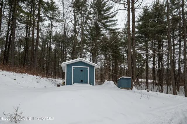a house with trees in the background