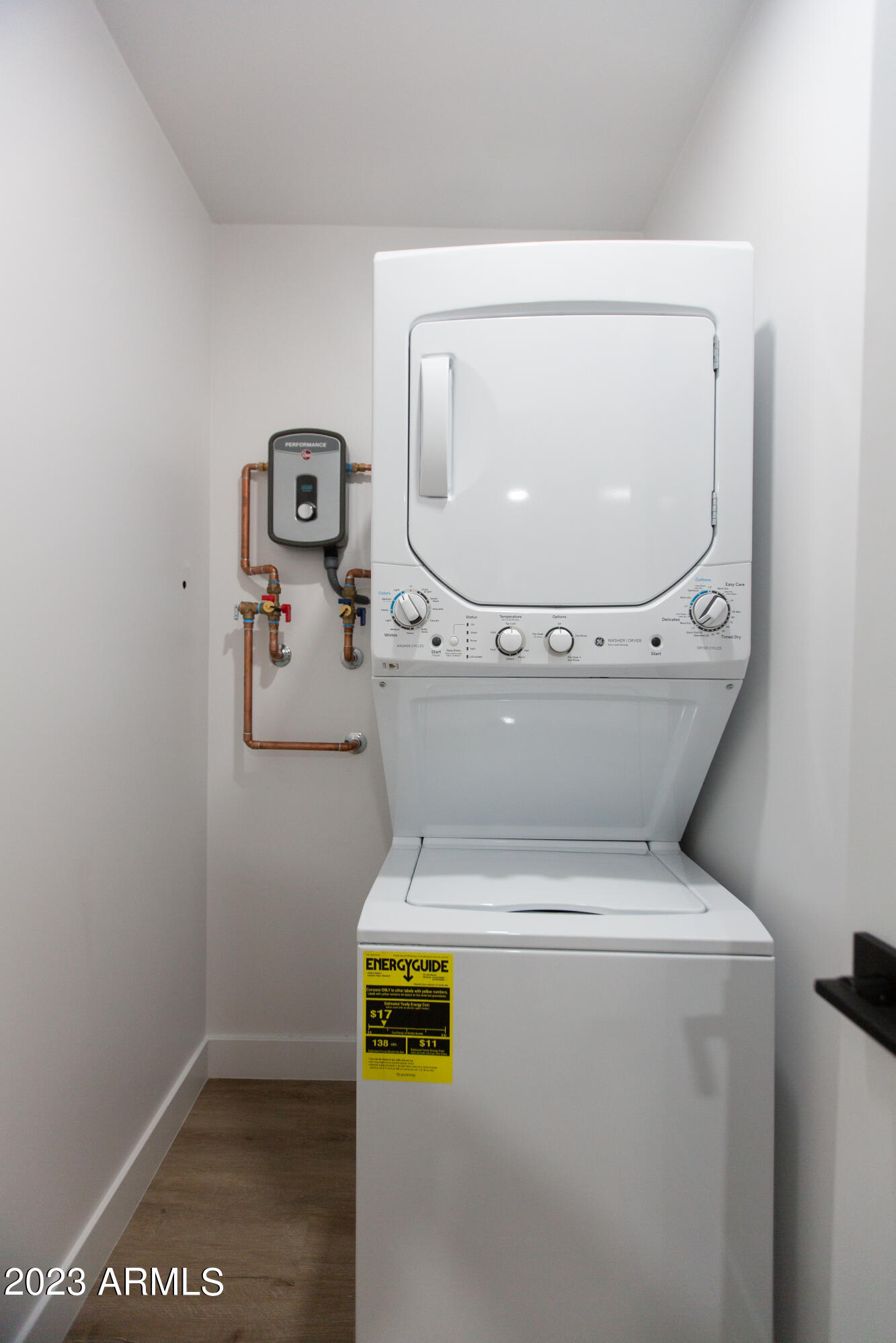 3133 East Fairmount Avenue Phoenix, AZ 85016 - Photo 8 of 11 a utility room with dryer and washer