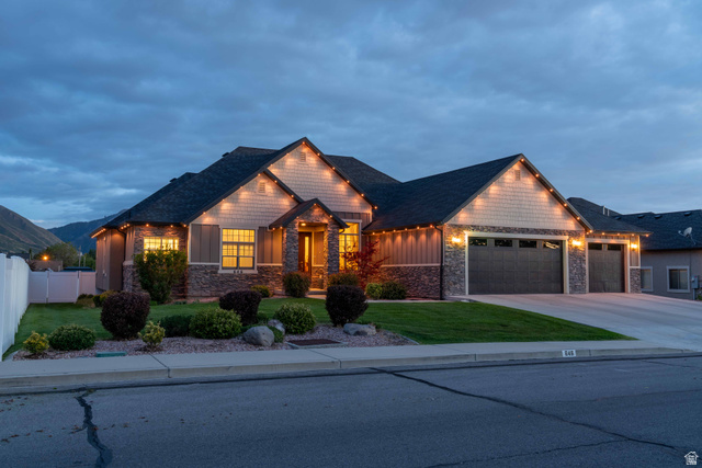 646 East 1400th Street North Mapleton, UT 84664 - Photo 5 of 78 Exterior featuring stone accents, horizontal siding, and shake siding details
