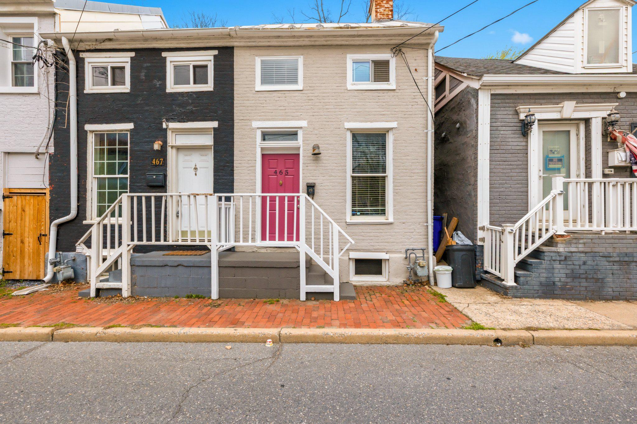 465 West South Street Frederick, MD 21701 - Photo 1 of 34 a view of a house with a patio and a yard
