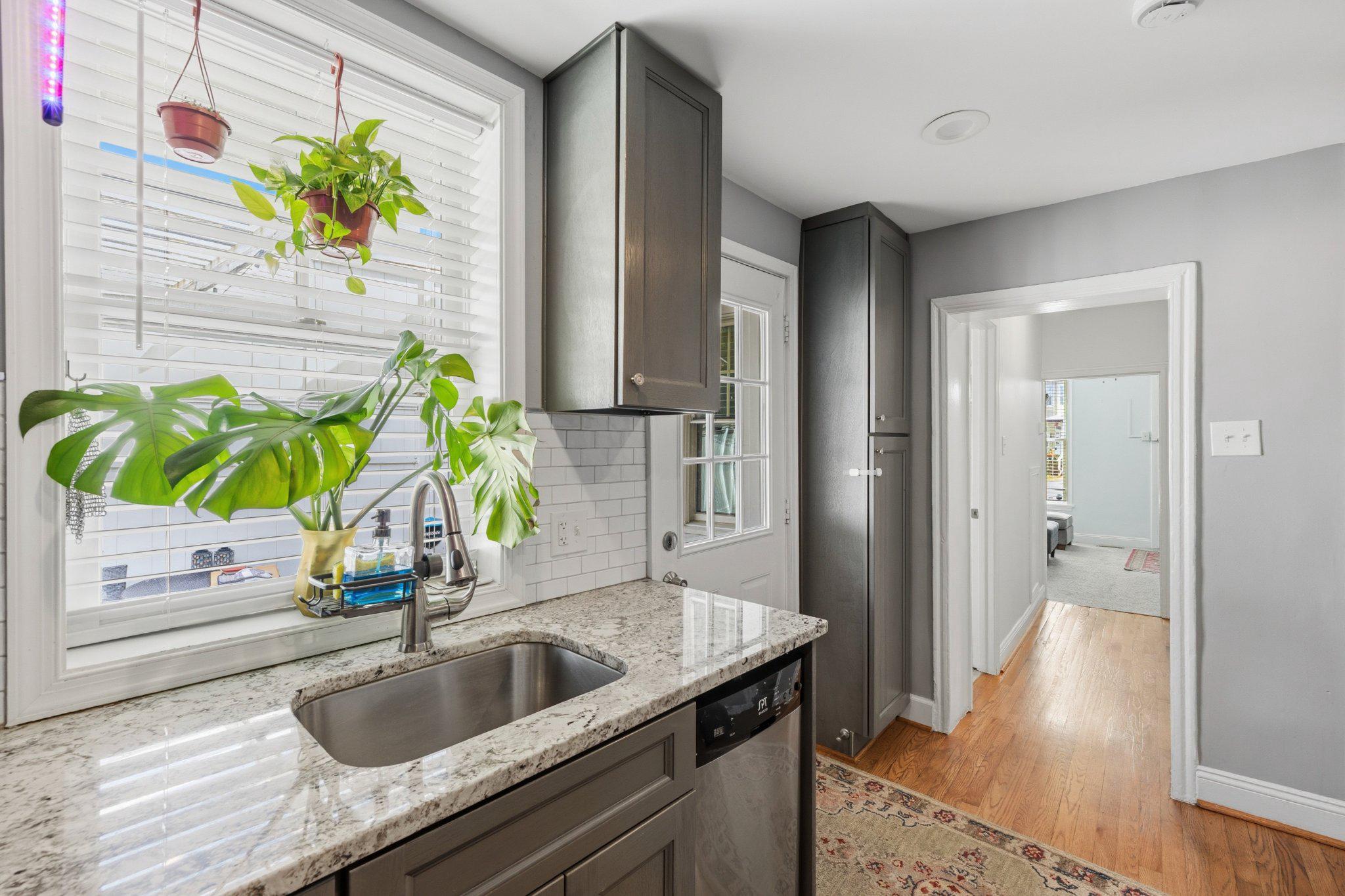 465 West South Street Frederick, MD 21701 - Photo 11 of 34 a kitchen with a sink a counter space and a sink