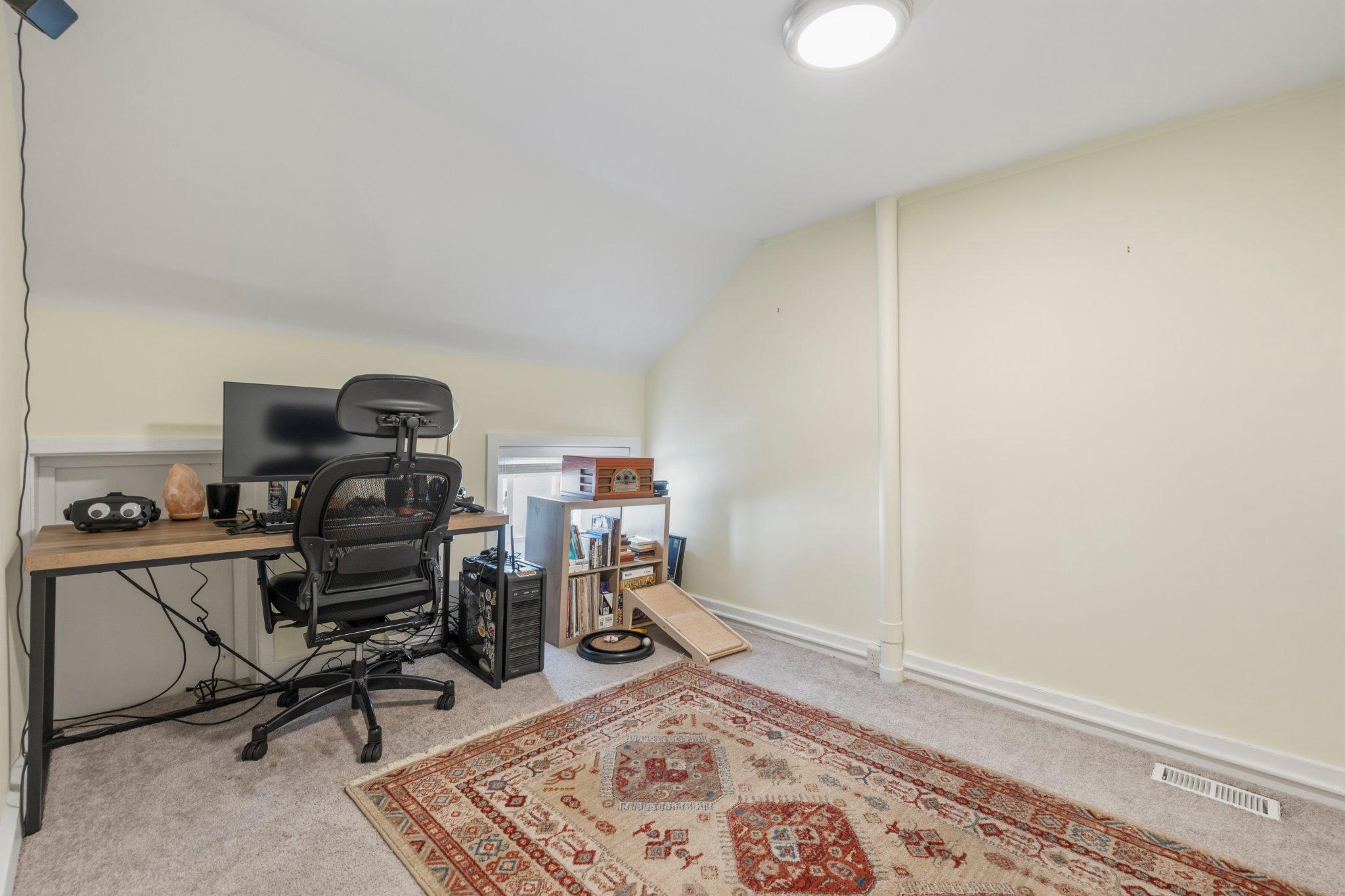 465 West South Street Frederick, MD 21701 - Photo 20 of 34 a view of a workspace with furniture and a window
