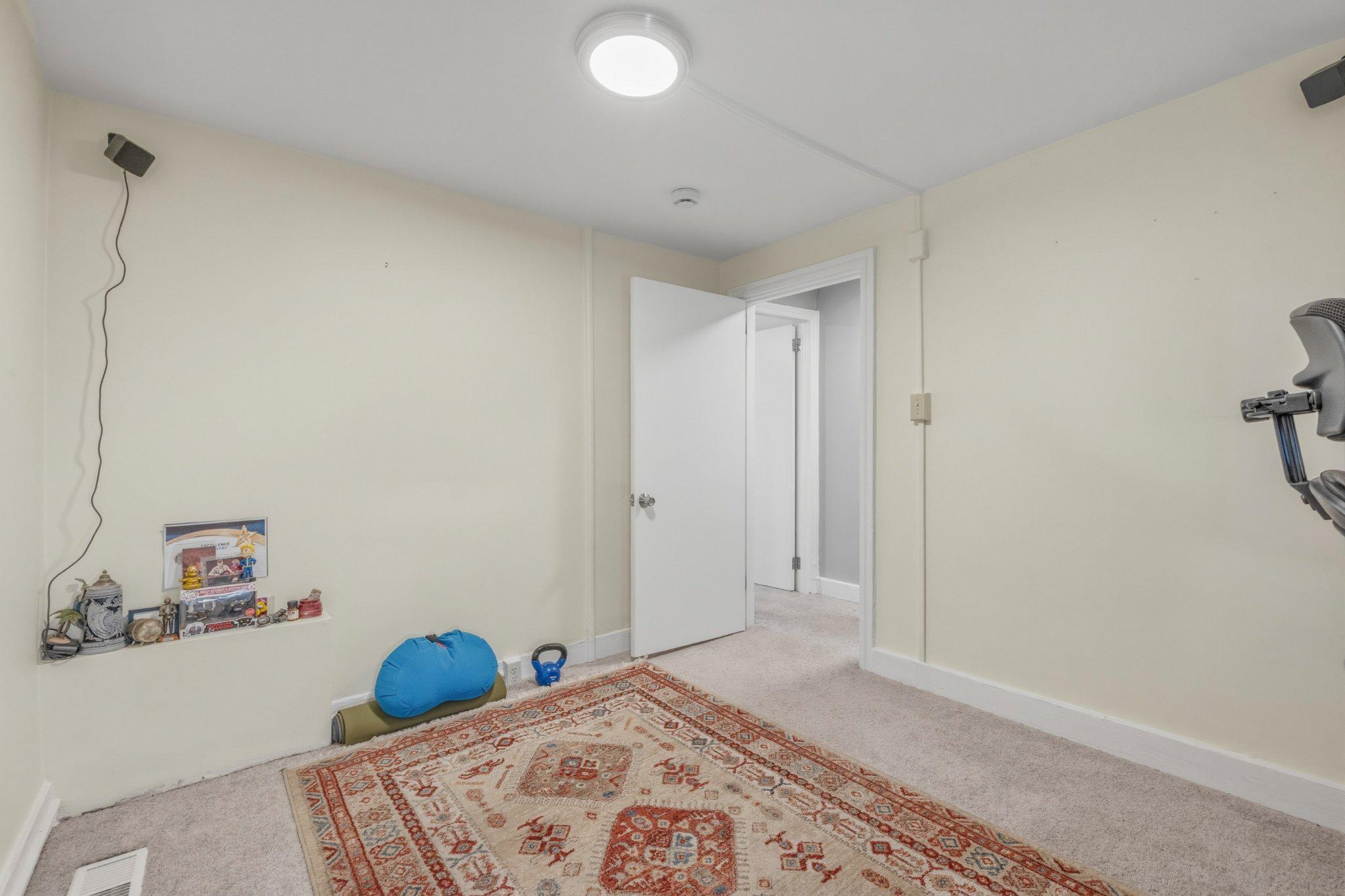 465 West South Street Frederick, MD 21701 - Photo 21 of 34 a bedroom with a bed and a cabinets