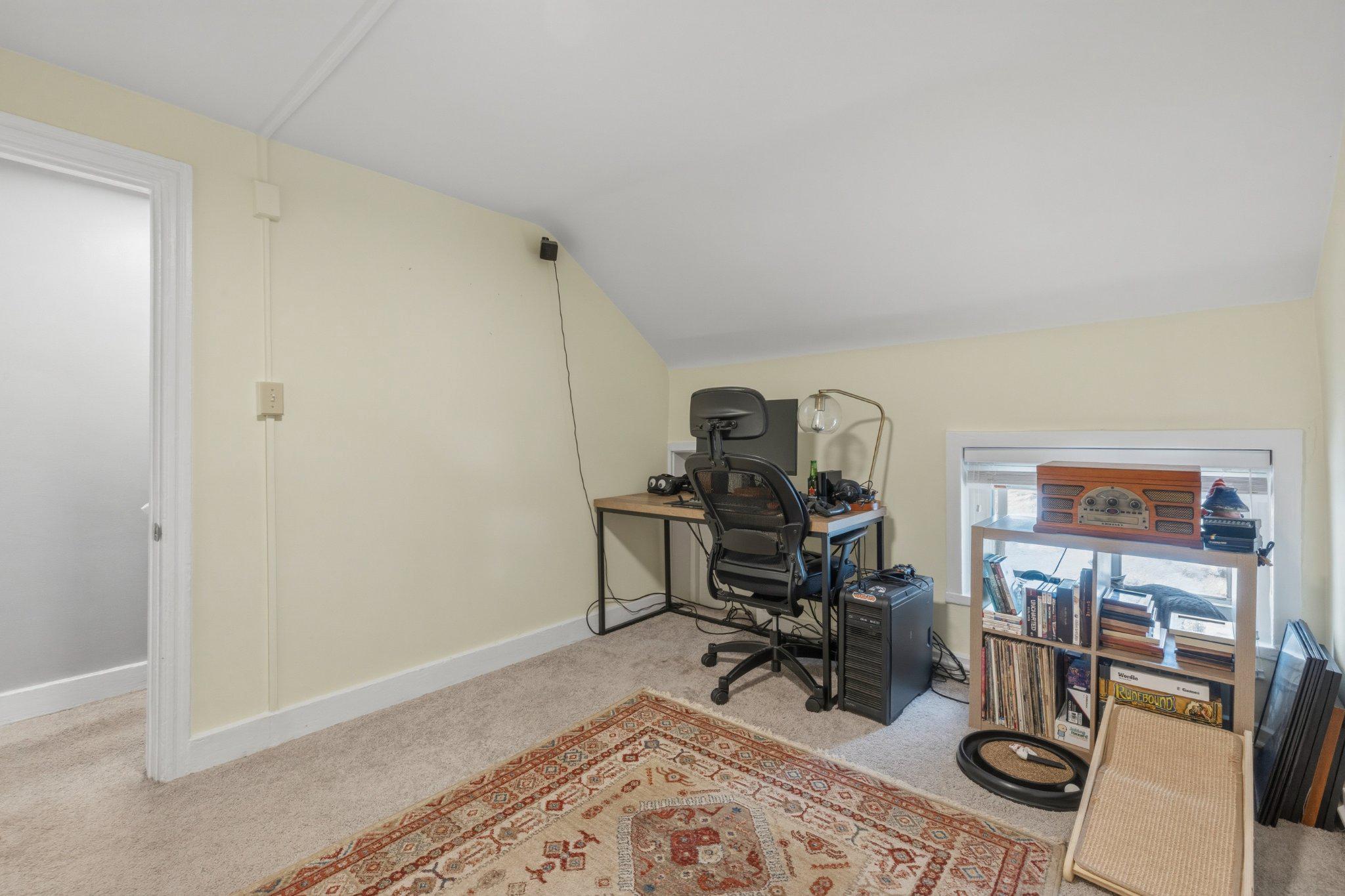 465 West South Street Frederick, MD 21701 - Photo 22 of 34 a view of a workspace with furniture and wooden floor