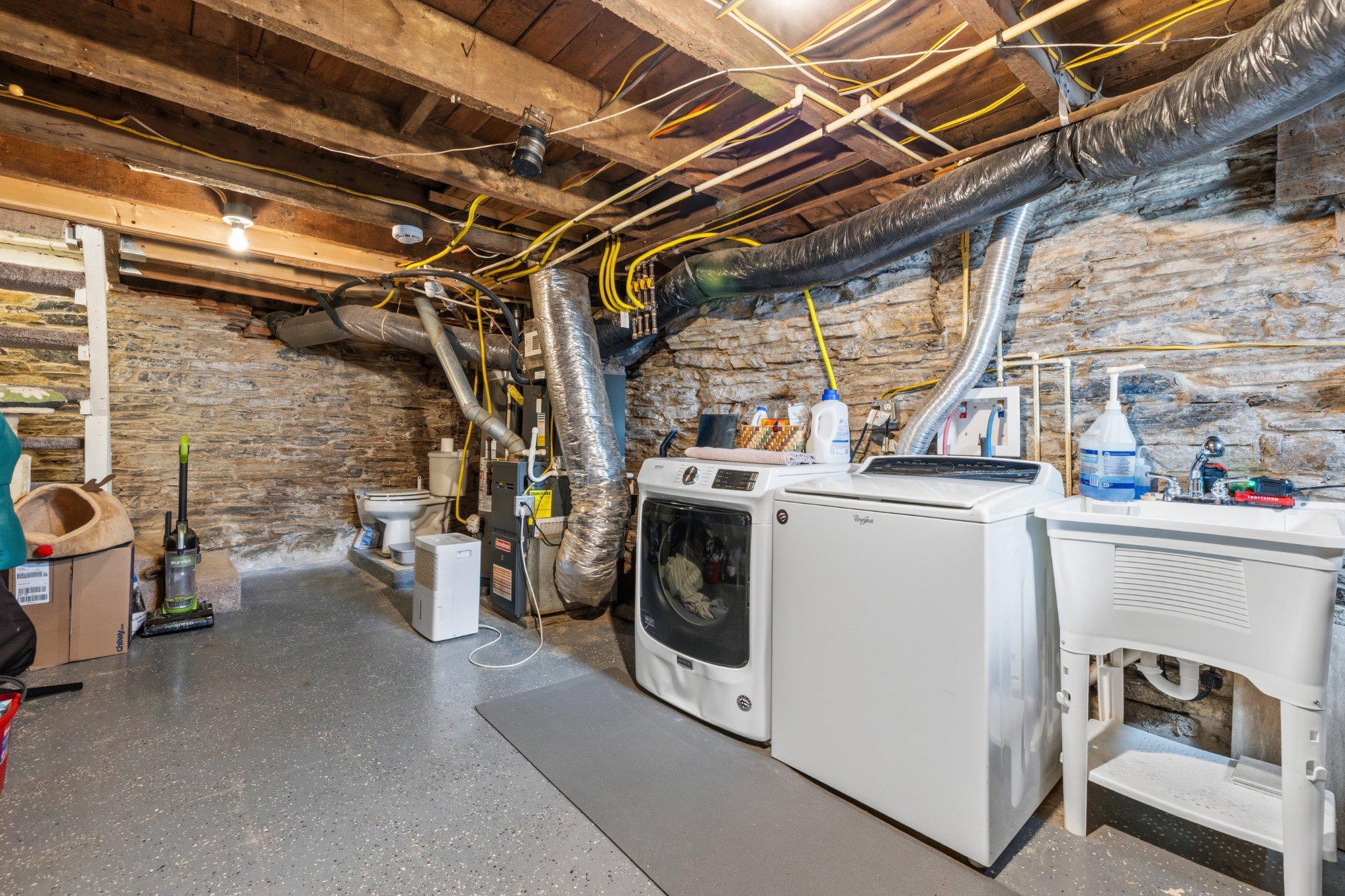 465 West South Street Frederick, MD 21701 - Photo 23 of 34 a utility room with dryer and washer