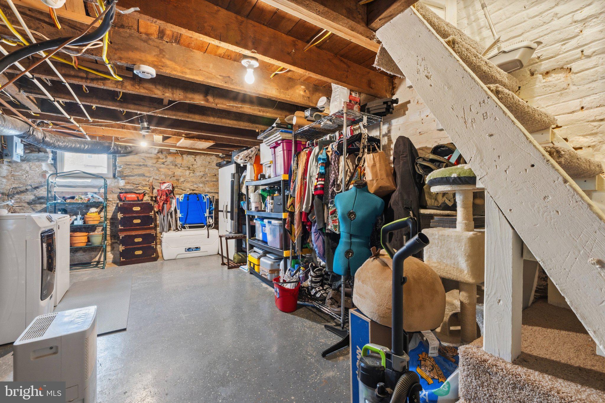 465 West South Street Frederick, MD 21701 - Photo 25 of 34 a view of a storage room with washer and dryer