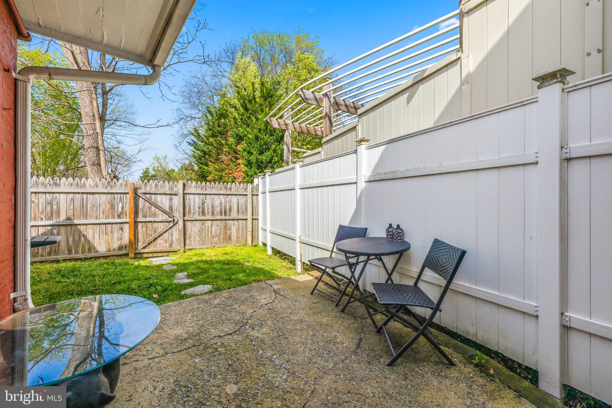 465 West South Street Frederick, MD 21701 - Photo 26 of 34 a view of a chair and table in backyard of the house