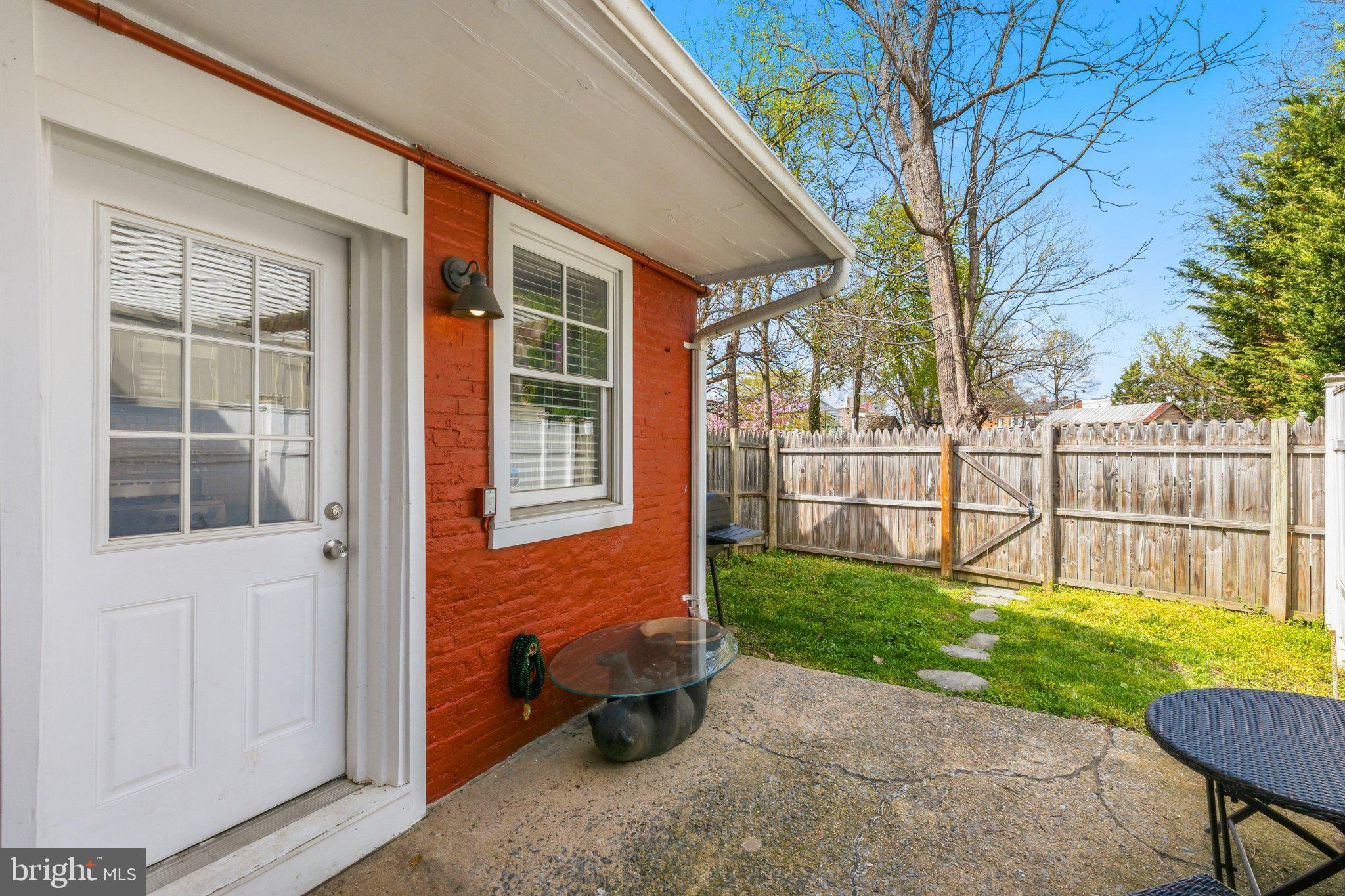 465 West South Street Frederick, MD 21701 - Photo 27 of 34 a backyard of a house with barbeque oven