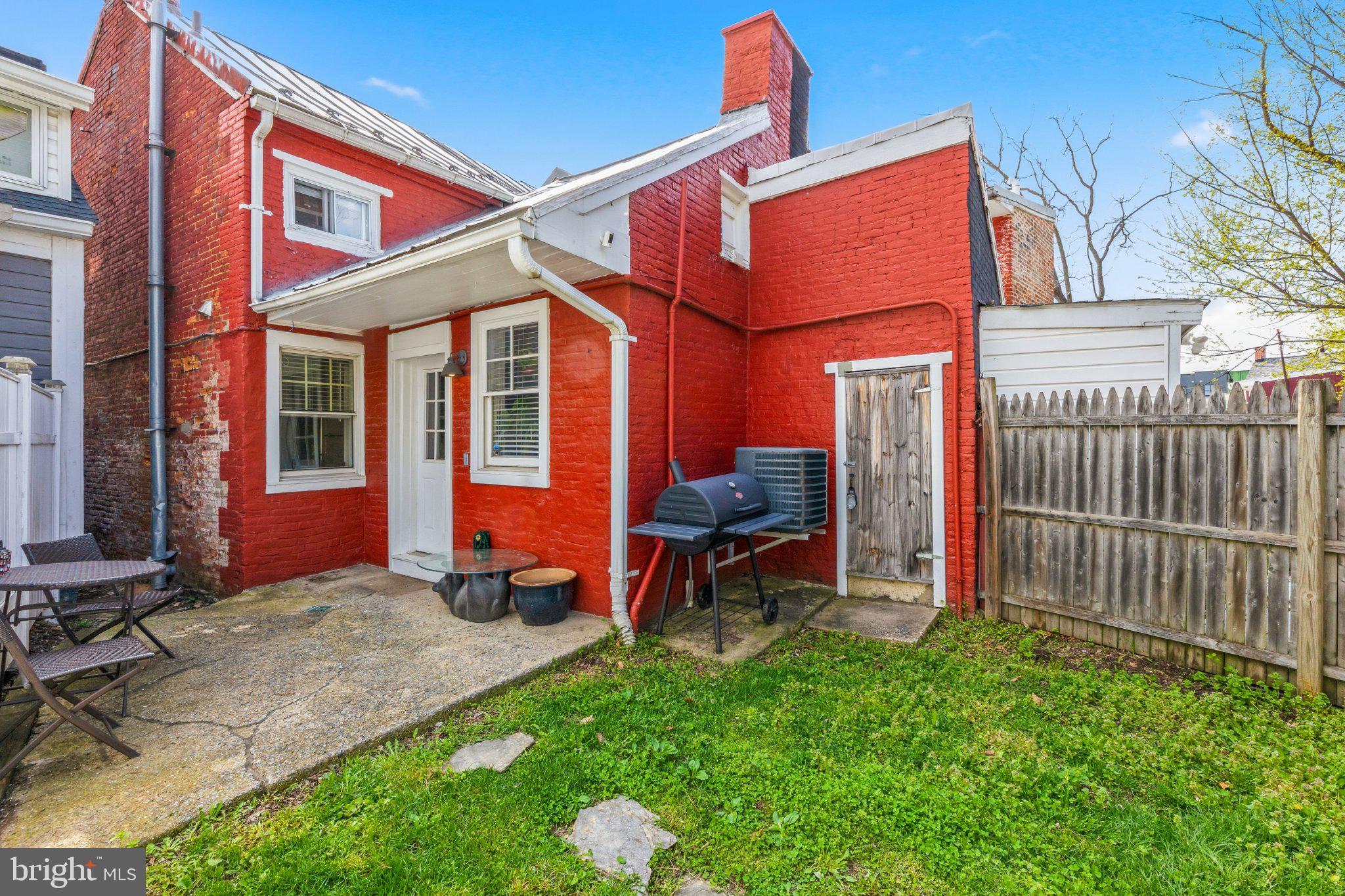465 West South Street Frederick, MD 21701 - Photo 28 of 34 a view of a house with backyard