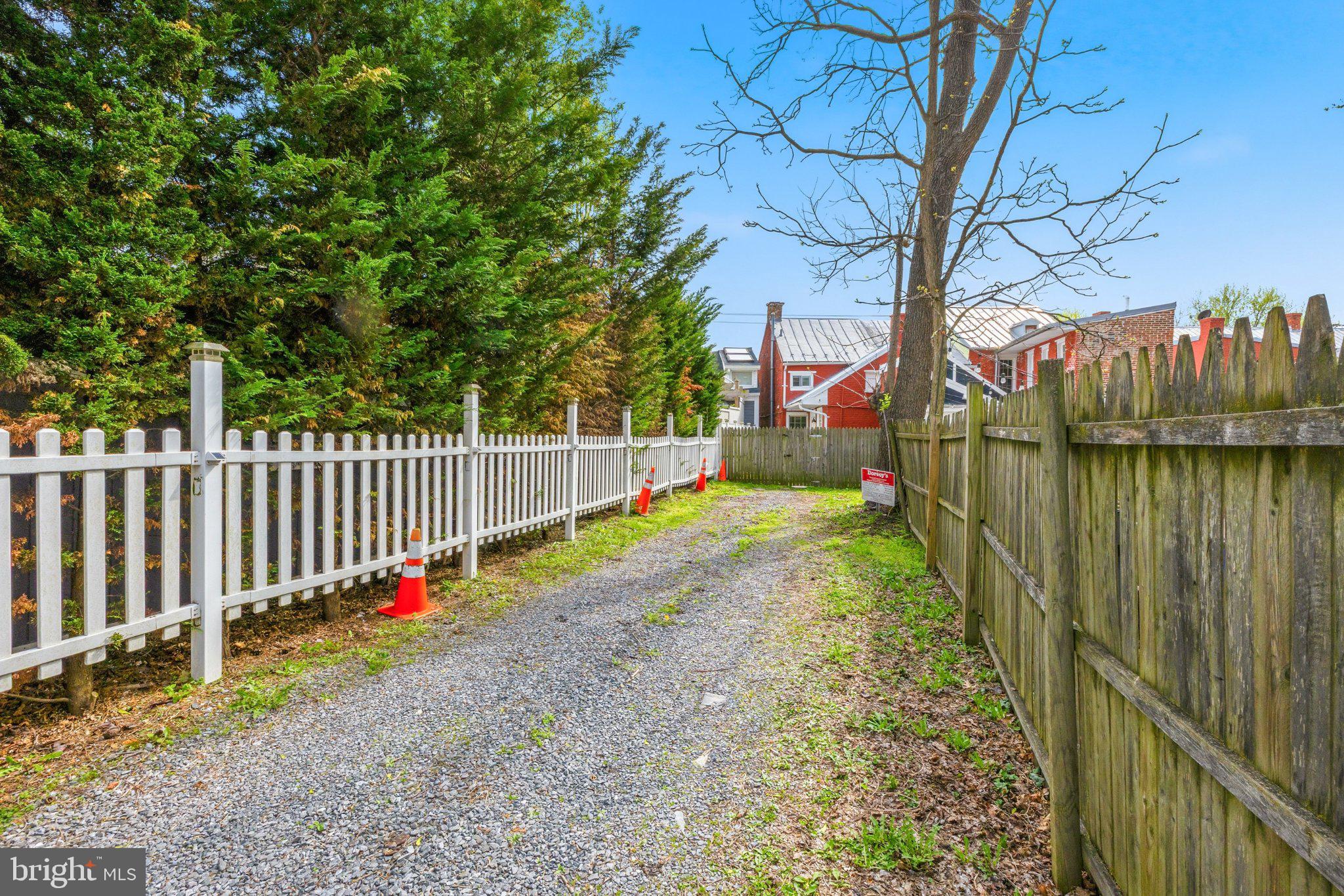 465 West South Street Frederick, MD 21701 - Photo 32 of 34 a view of a garden with wooden fence