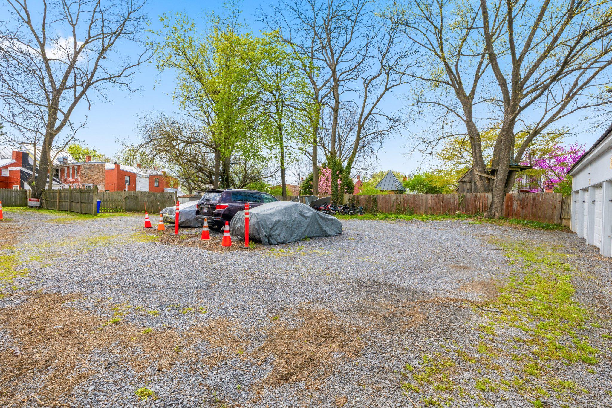 465 West South Street Frederick, MD 21701 - Photo 6 of 34 a front view of a house with a yard and garage
