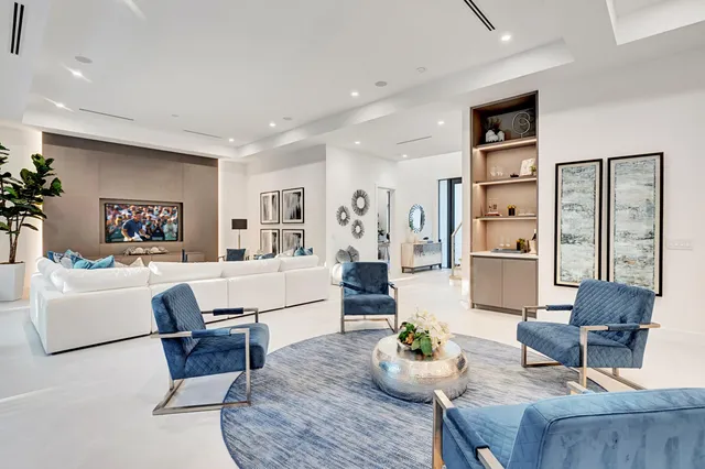 a living room with furniture and a table